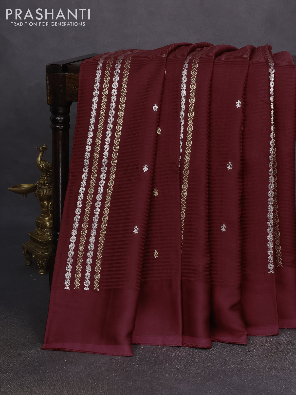 Banarasi mushru silk saree maroon with allover stripes pattern & zari weaves and satin border