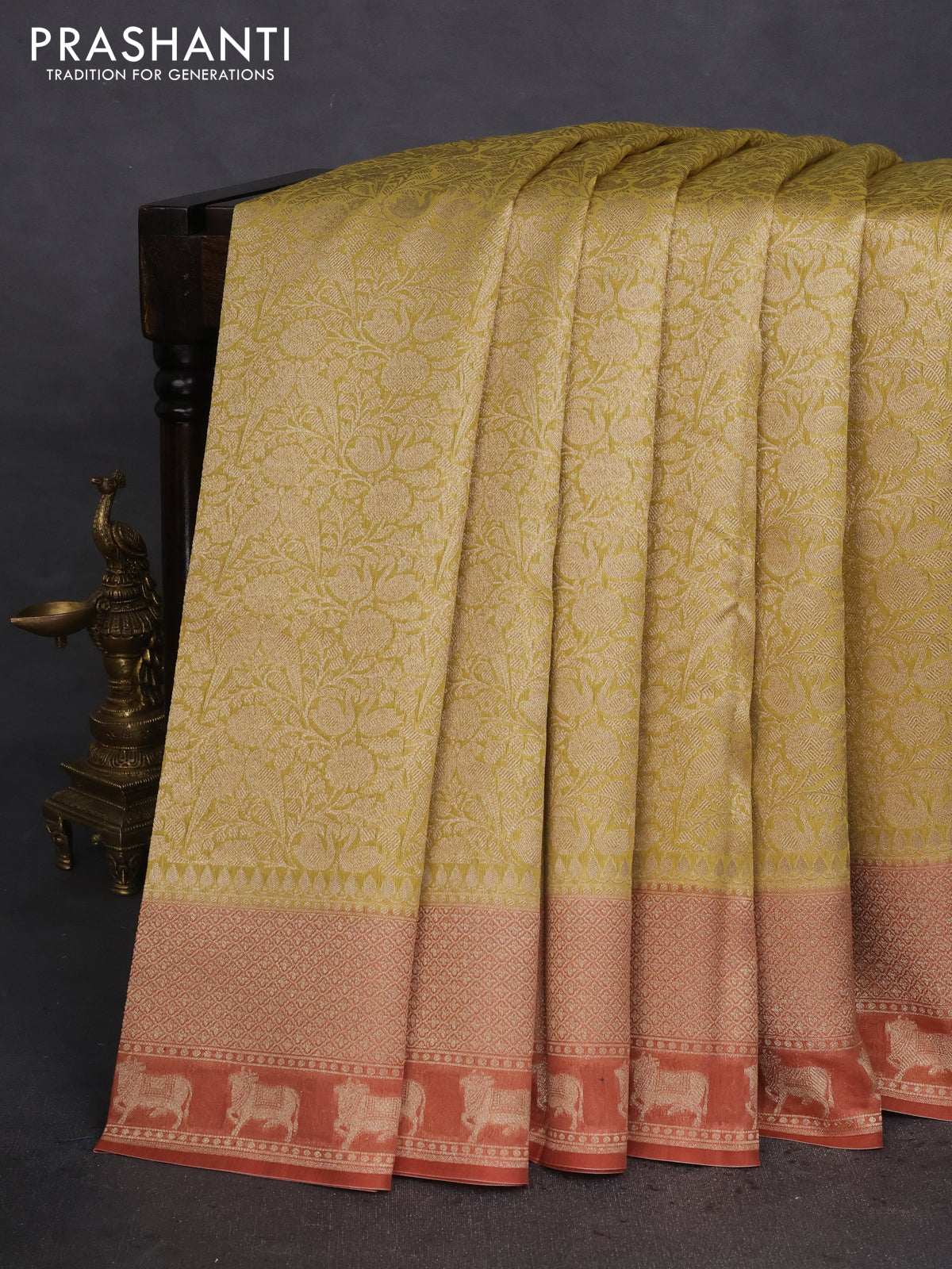 Banarasi silk cotton saree lime yellow and rust shade with allover zari woven brocade weaves and woven border