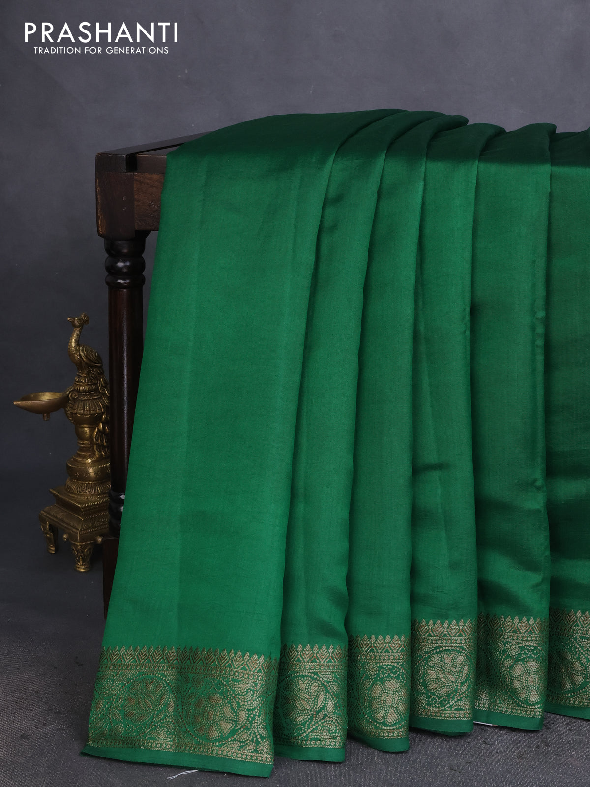 Chiniya silk saree green and maroon with plain body and woven border