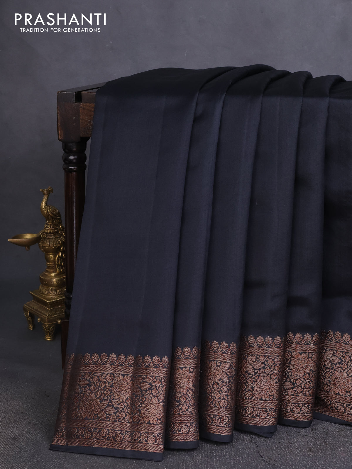 Chiniya silk saree black and maroon with plain body and woven border