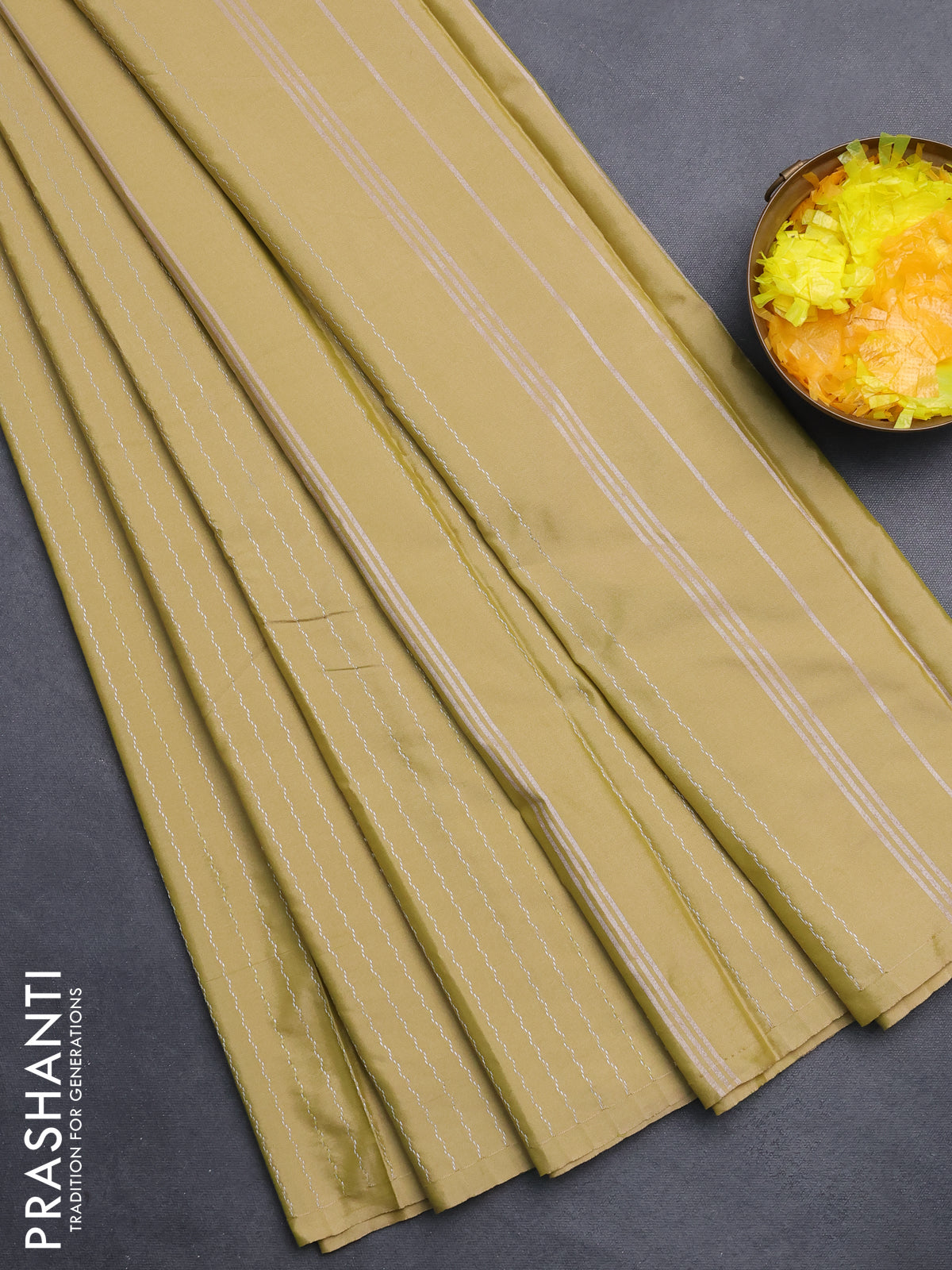 Arani semi silk saree elaichi green with allover silver zari weaves in borderless style