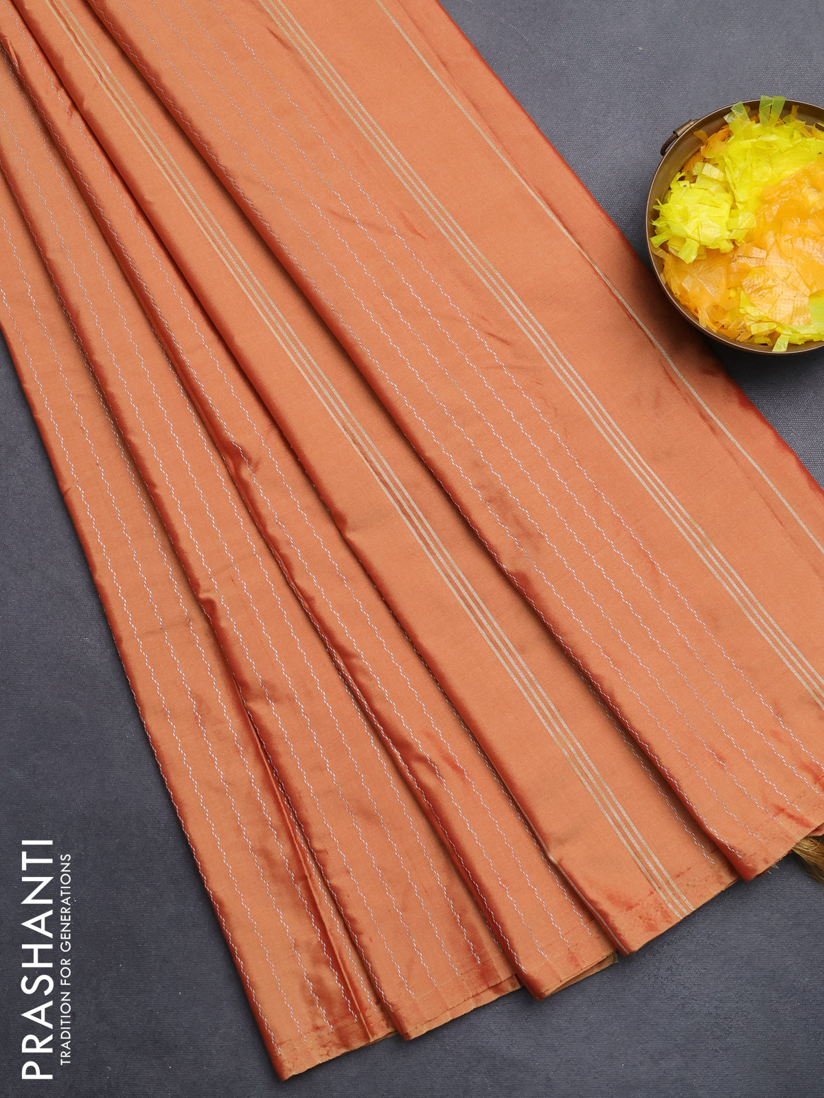 Arani semi silk saree rust shade with allover silver zari weaves in borderless style