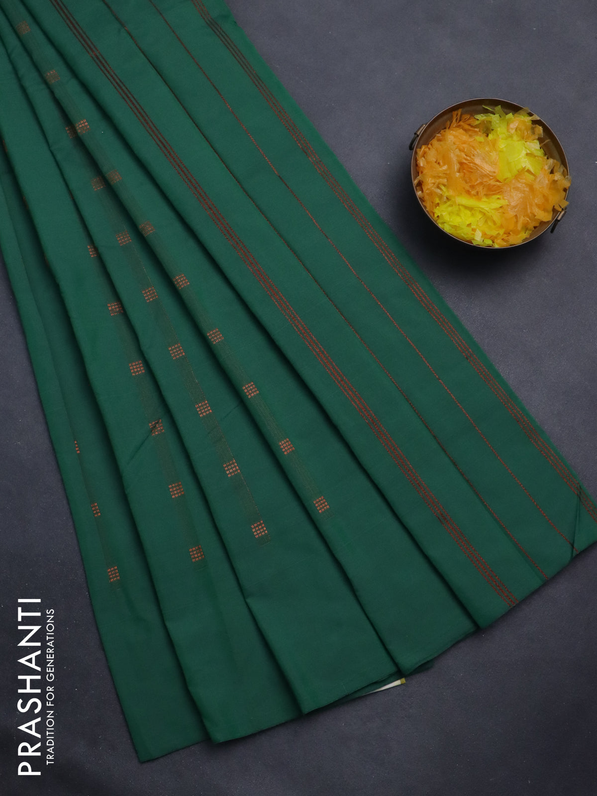 Arani semi silk saree greeen with copper zari woven buttas in borderless style