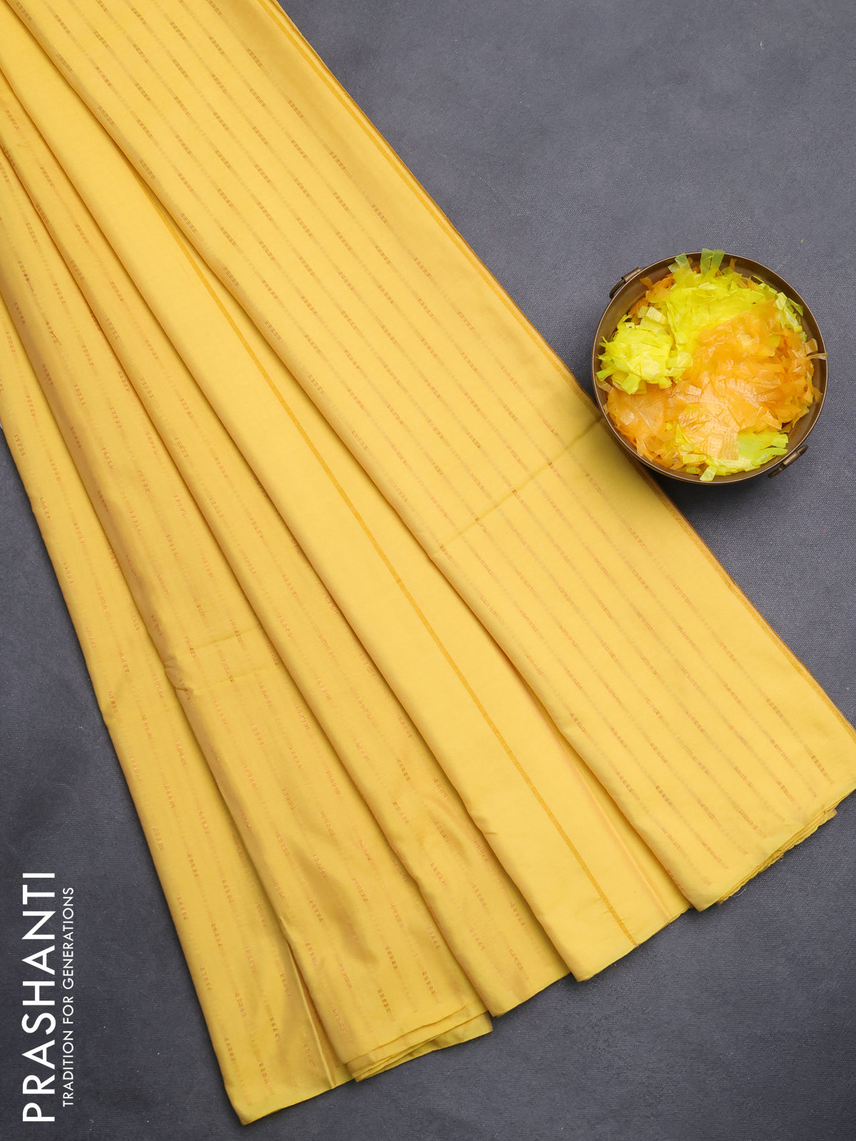 Arani semi silk saree yellow with zari woven buttas in borderless style