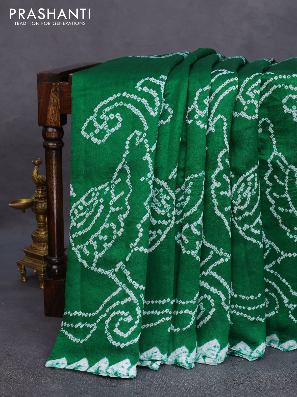 Chiniya silk saree green with allover bandhani prints