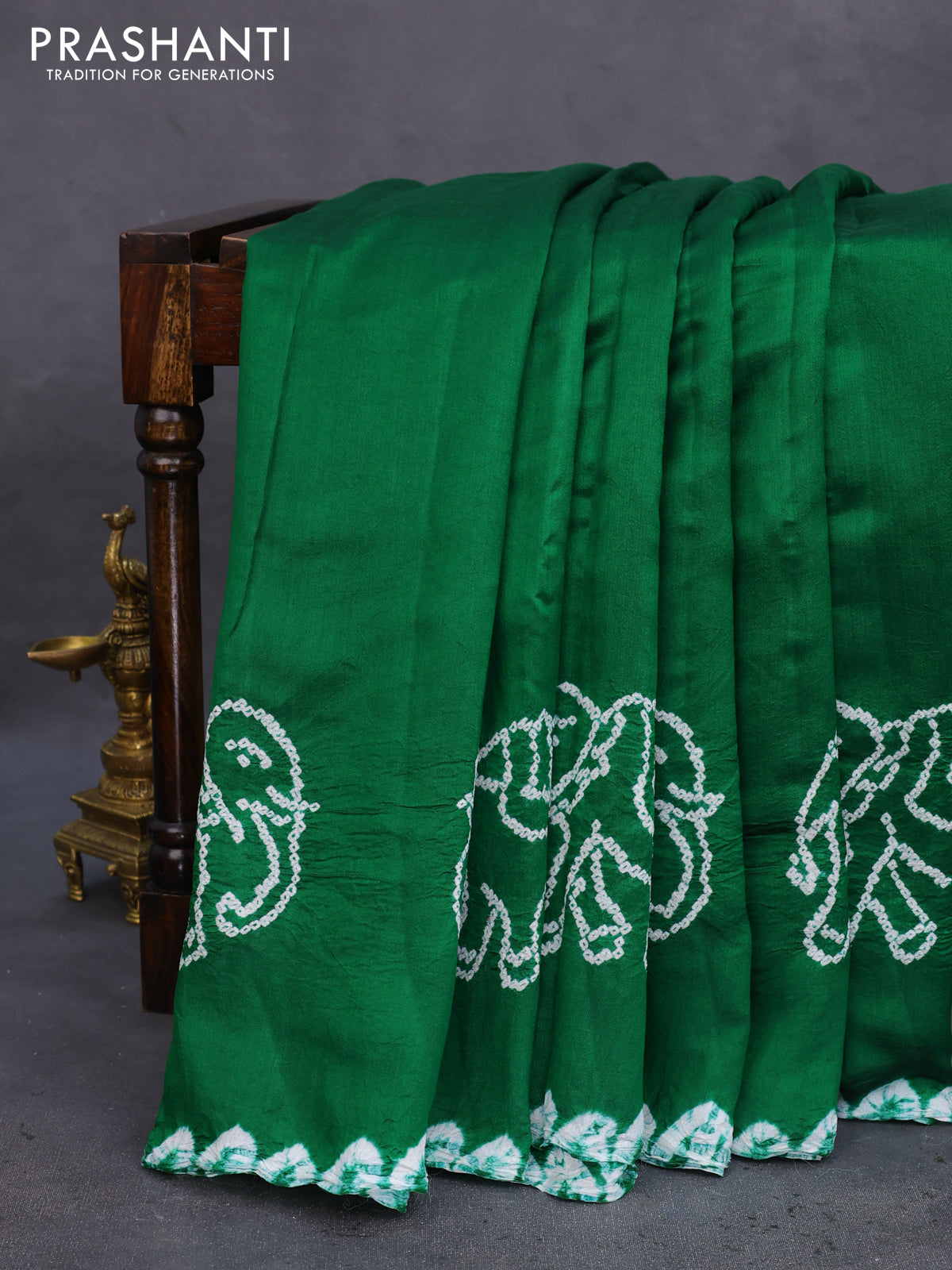 Chiniya silk saree green with allover bandhani prints