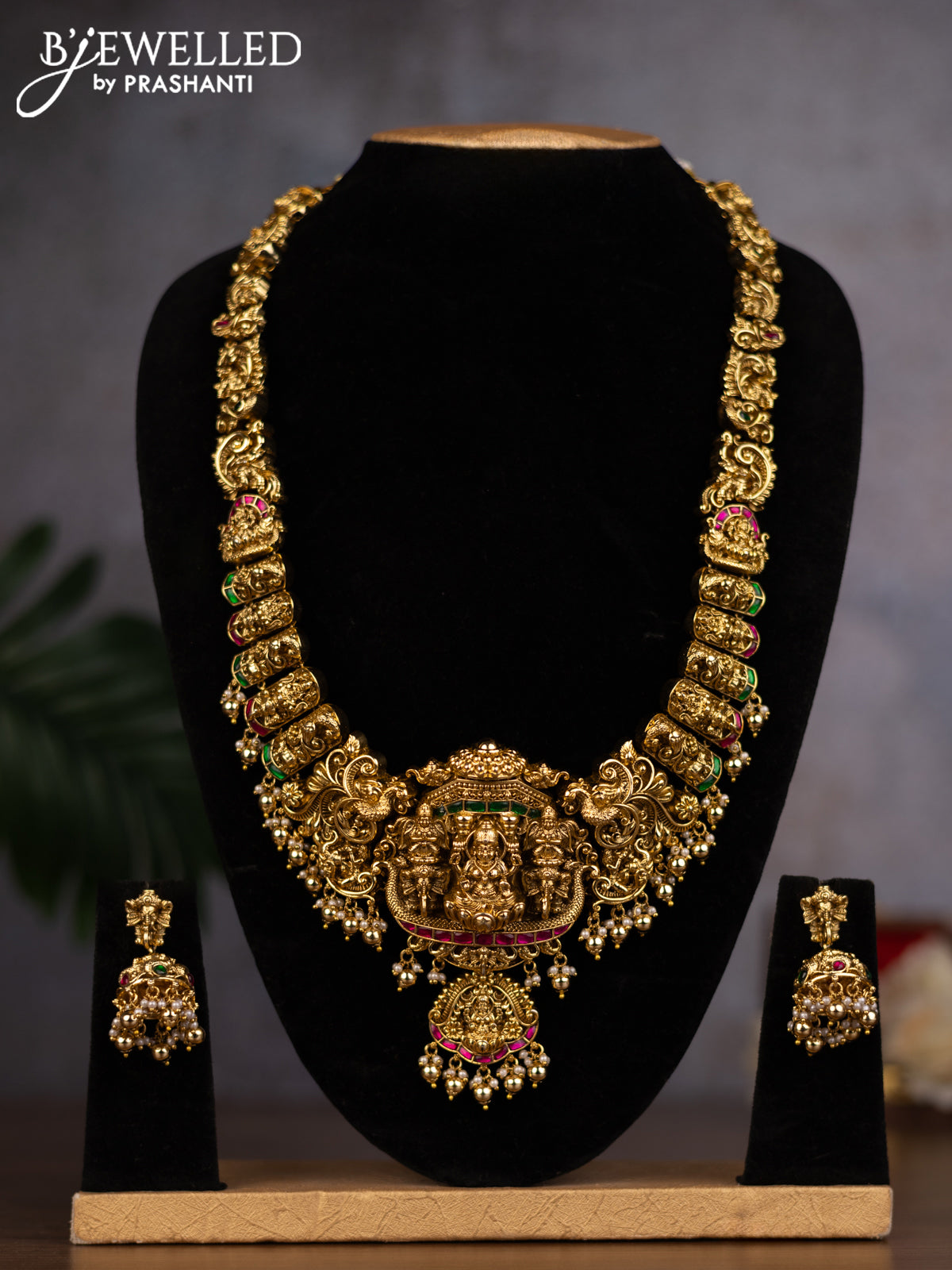 Antique haaram lakshmi design with jadau stones and pearl & golden beads hanging