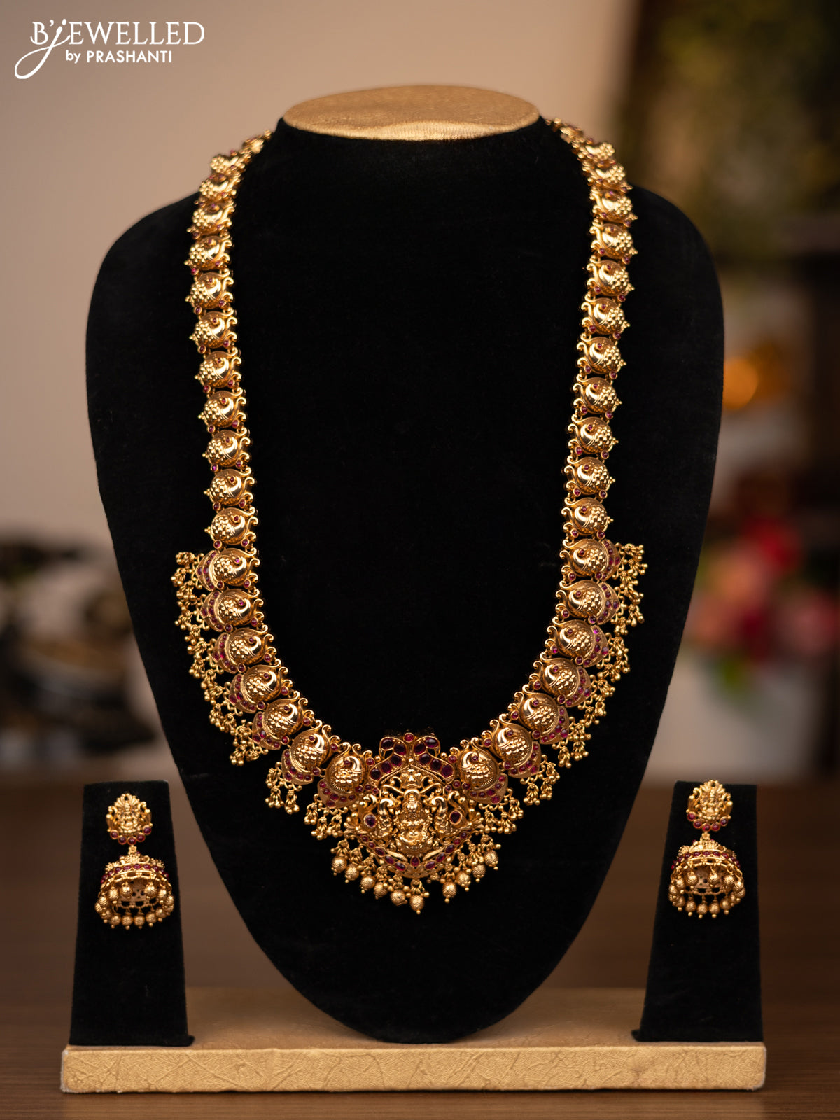 Antique haaram peacock & lakshmi design with pink kemp stones and golden beads hanging
