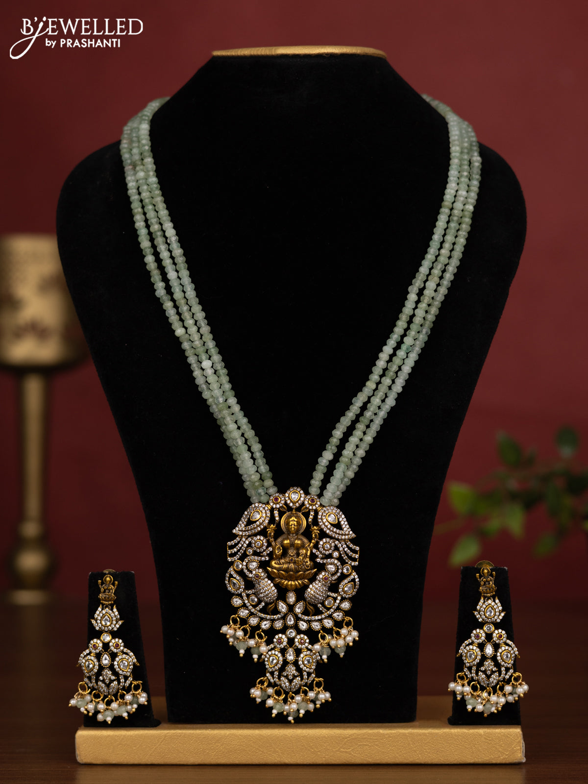 Beaded triple layer mint green necklace lakshmi pendant with kundan & cz stones and pearl & beads hanging in victorian finish