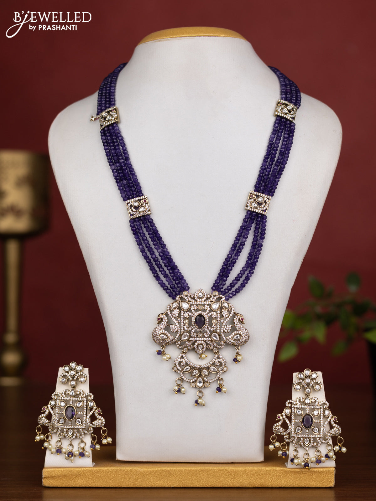 Beaded multilayer violet necklace with kundan & cz stones and pearl & beads hanging in victorian finish