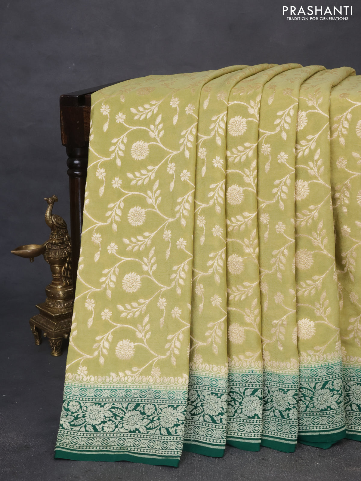 Banarasi crepe saree pista green and green with allover thread & zari weaves and woven border