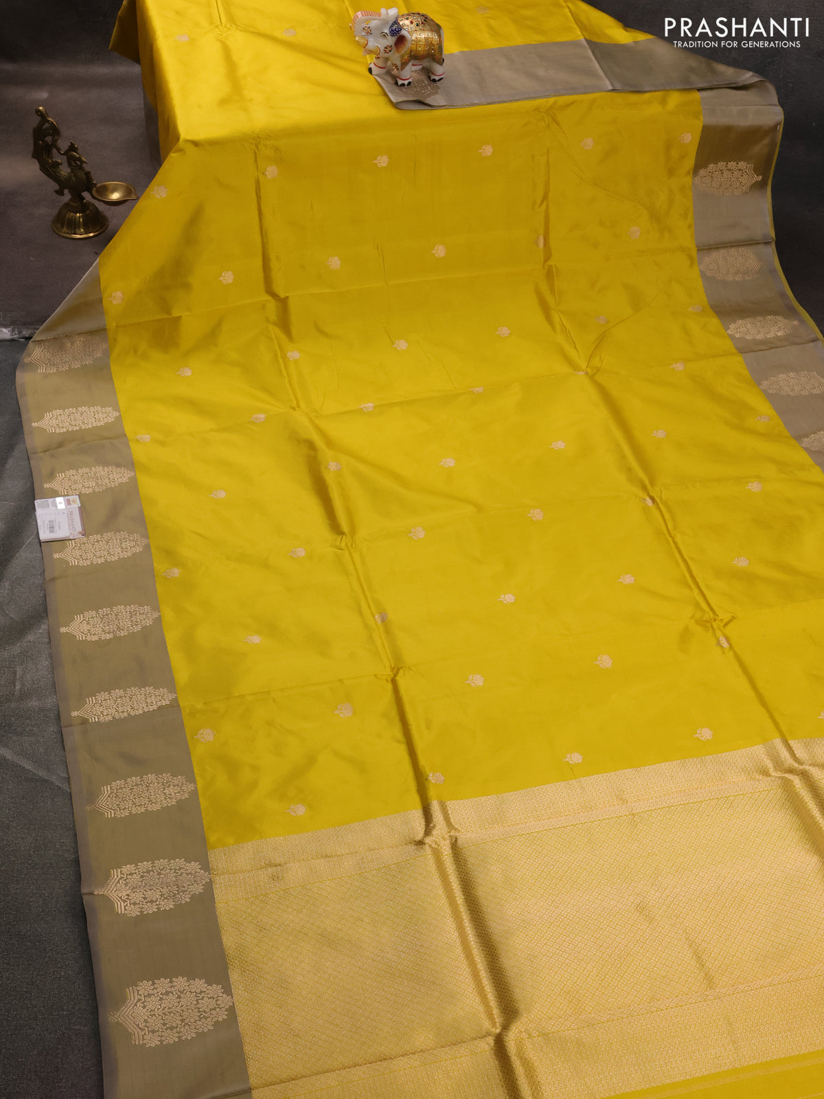 Banarasi katan silk saree yellow and grey shade with zari woven floral buttas and zari woven butta border