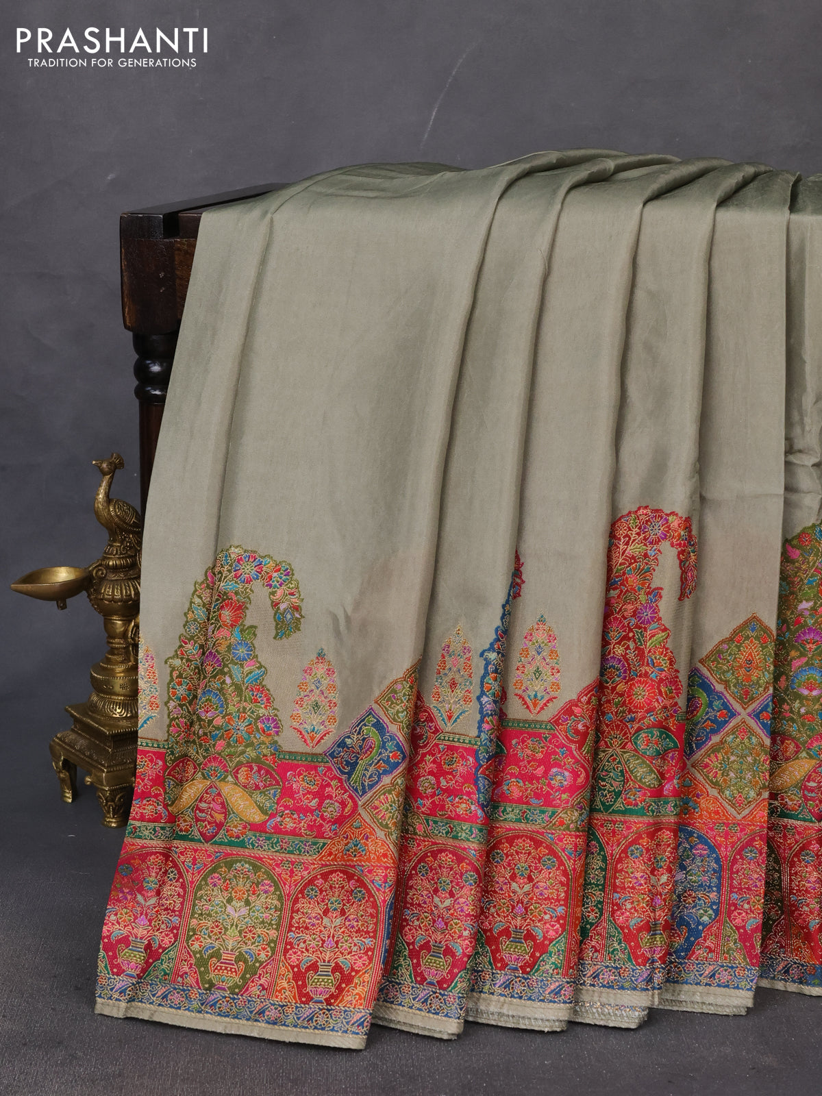 Banarasi silk saree pastel green with plain body and position prints