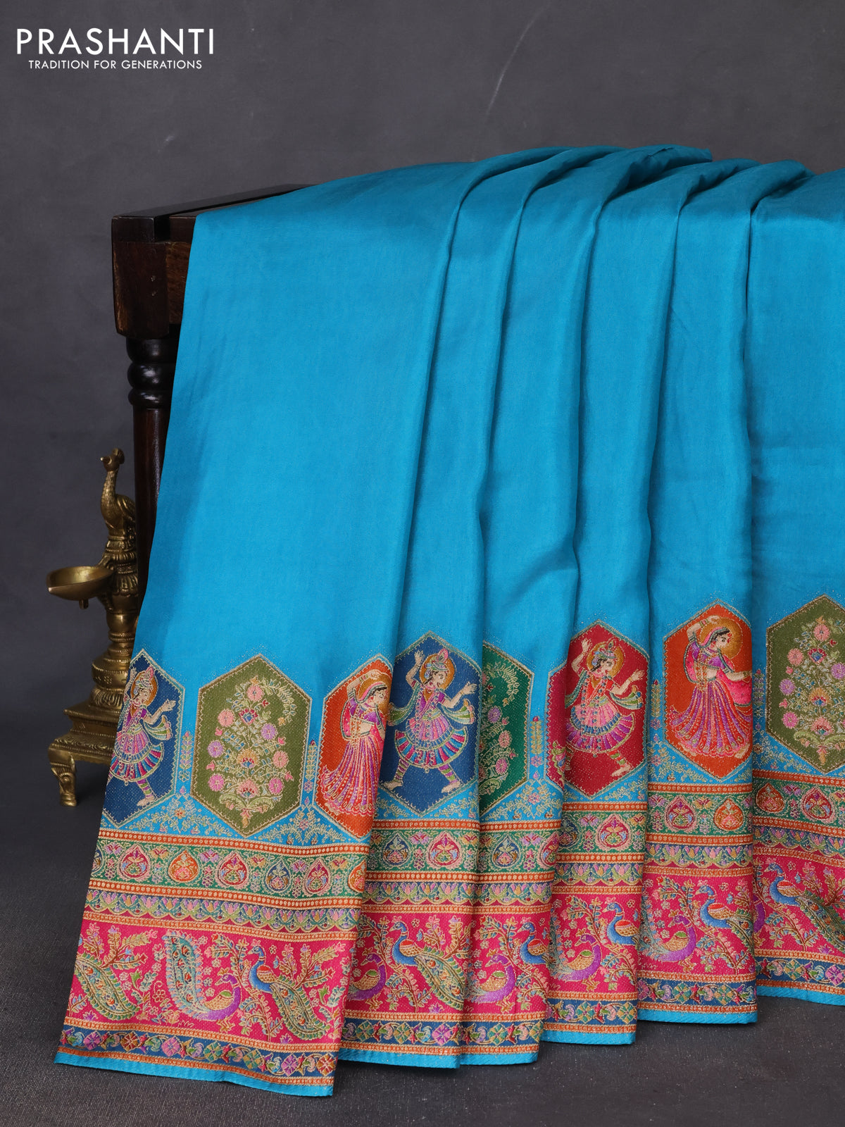 Banarasi silk saree teal blue with plain body and position prints