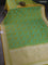 Banarasi semi mushru silk saree dual shade of mustard and teal green shade with allover self emboss and zari woven border