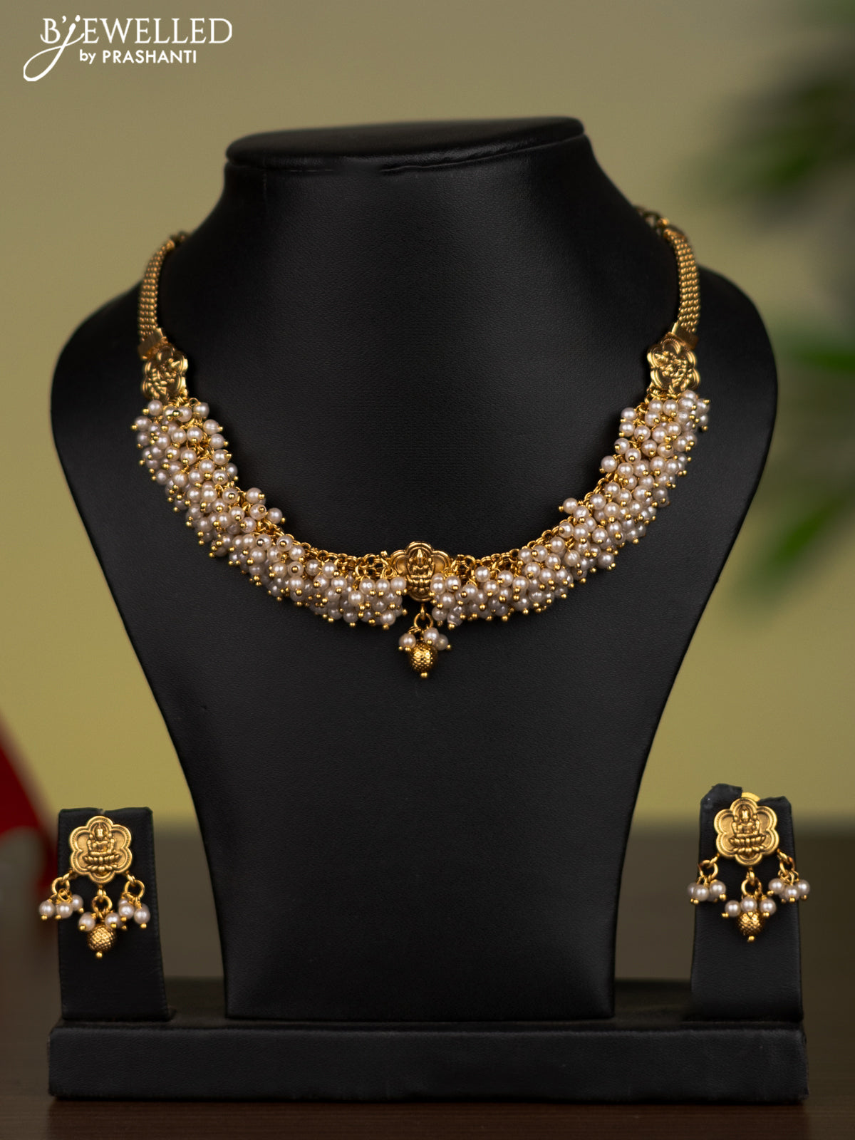 Antique attigai necklace with lakshmi pendant and pearl hangings