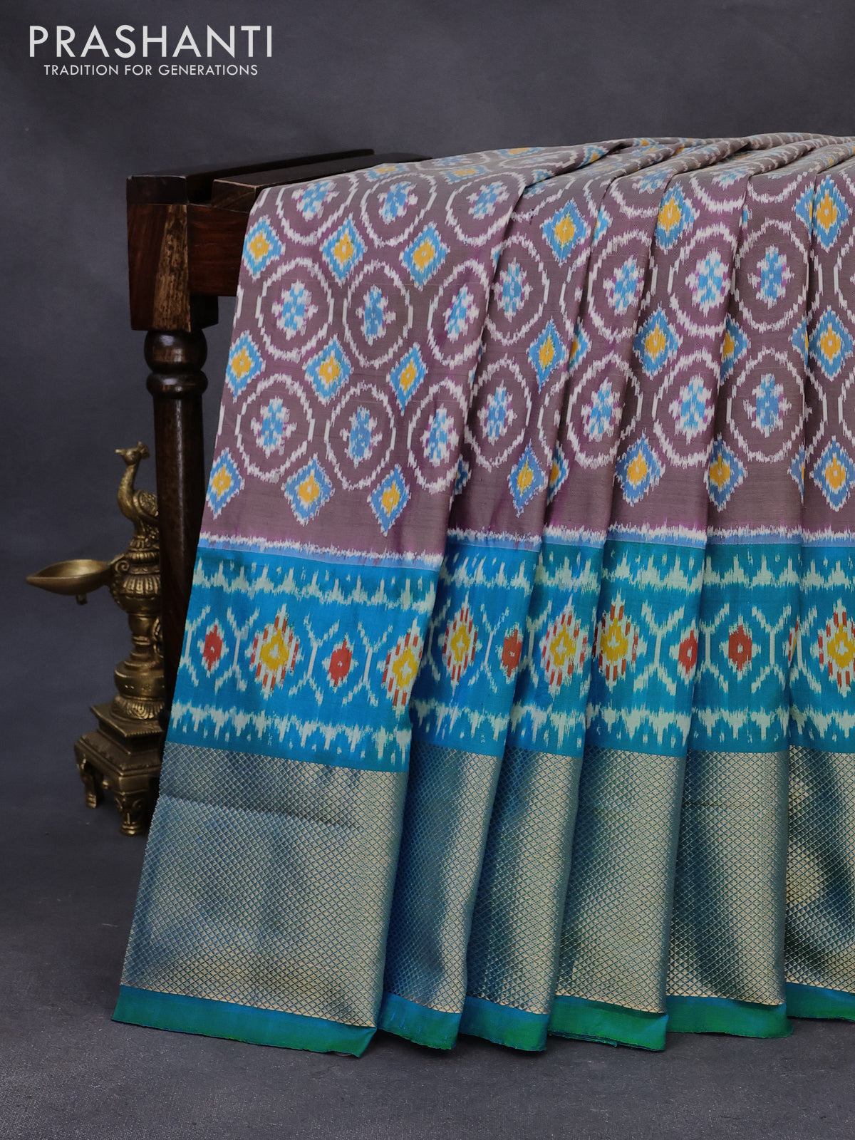 Pochampally silk saree grey and dual shade of teal blue with allover ikat weaves and ikat woven border