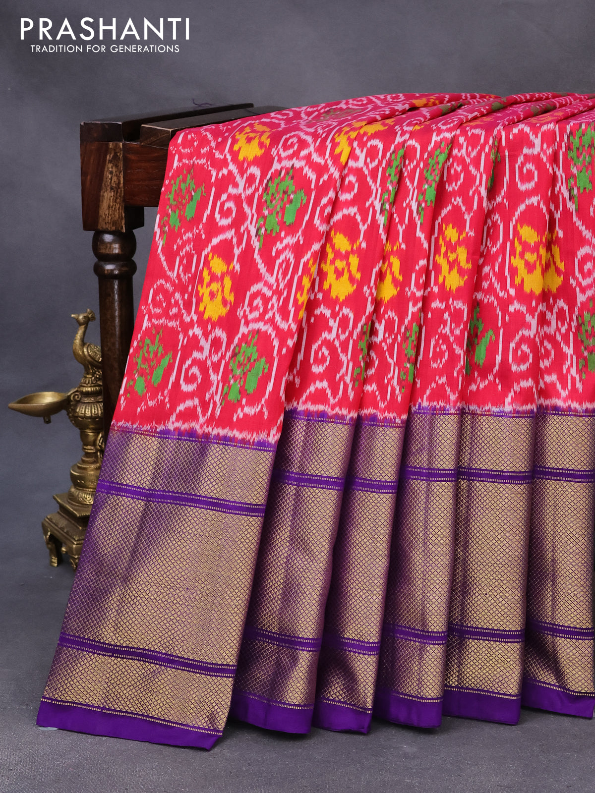 Pochampally silk saree reddish pink and violet with allover ikat weaves and long zari woven border