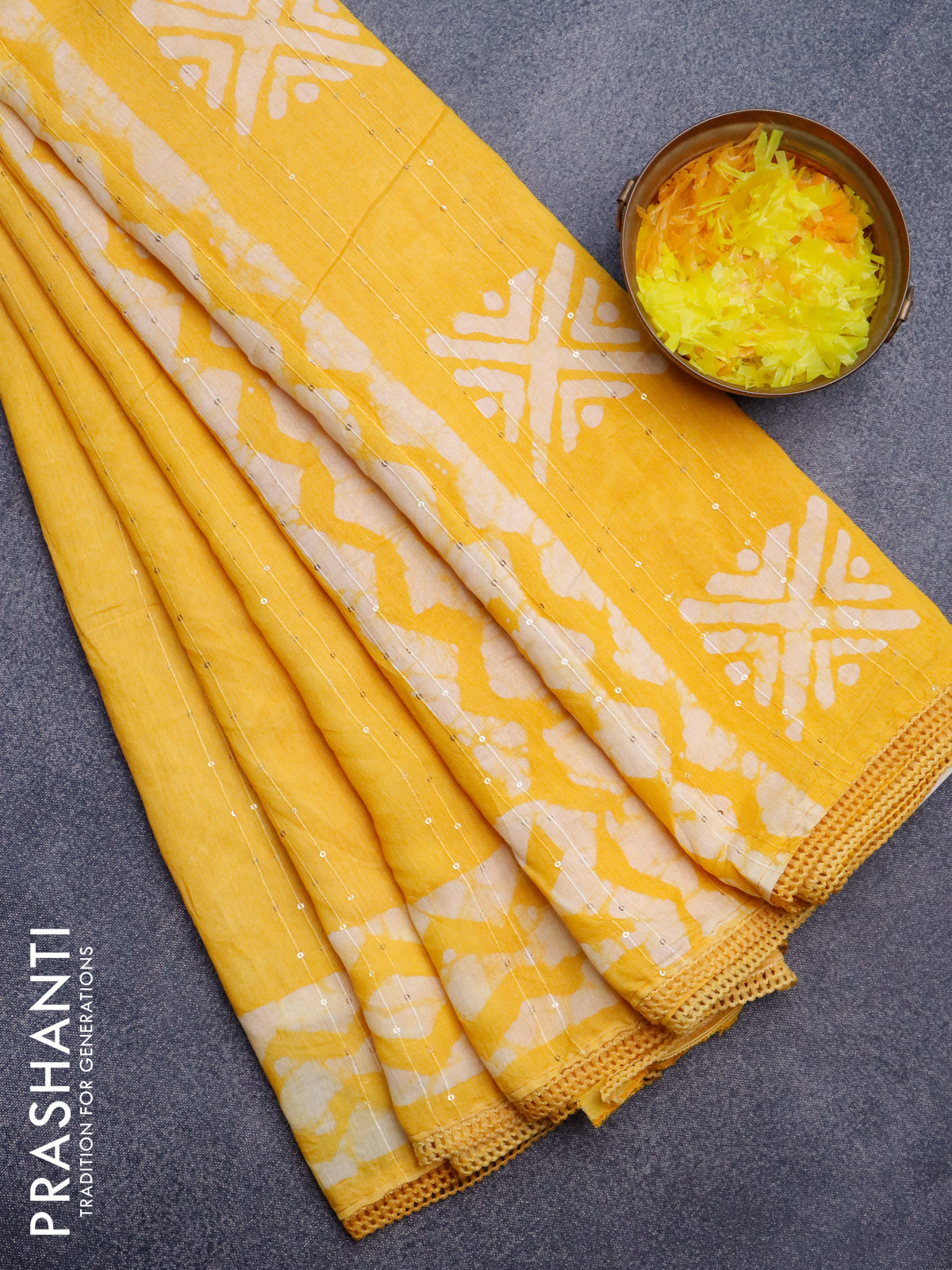 Batik cotton saree yellow with allover sequin work & batik butta prints and printed lace work border