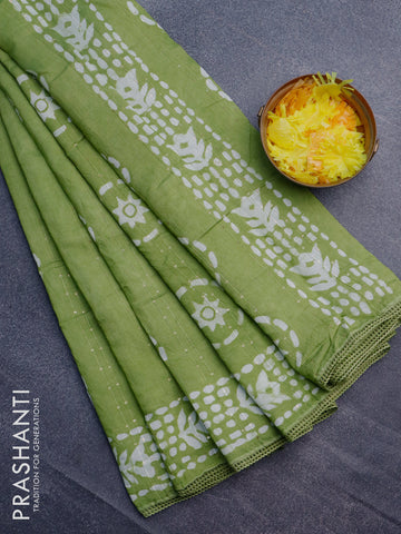 Batik cotton saree light green with allover sequin work & batik butta prints and printed lace work border