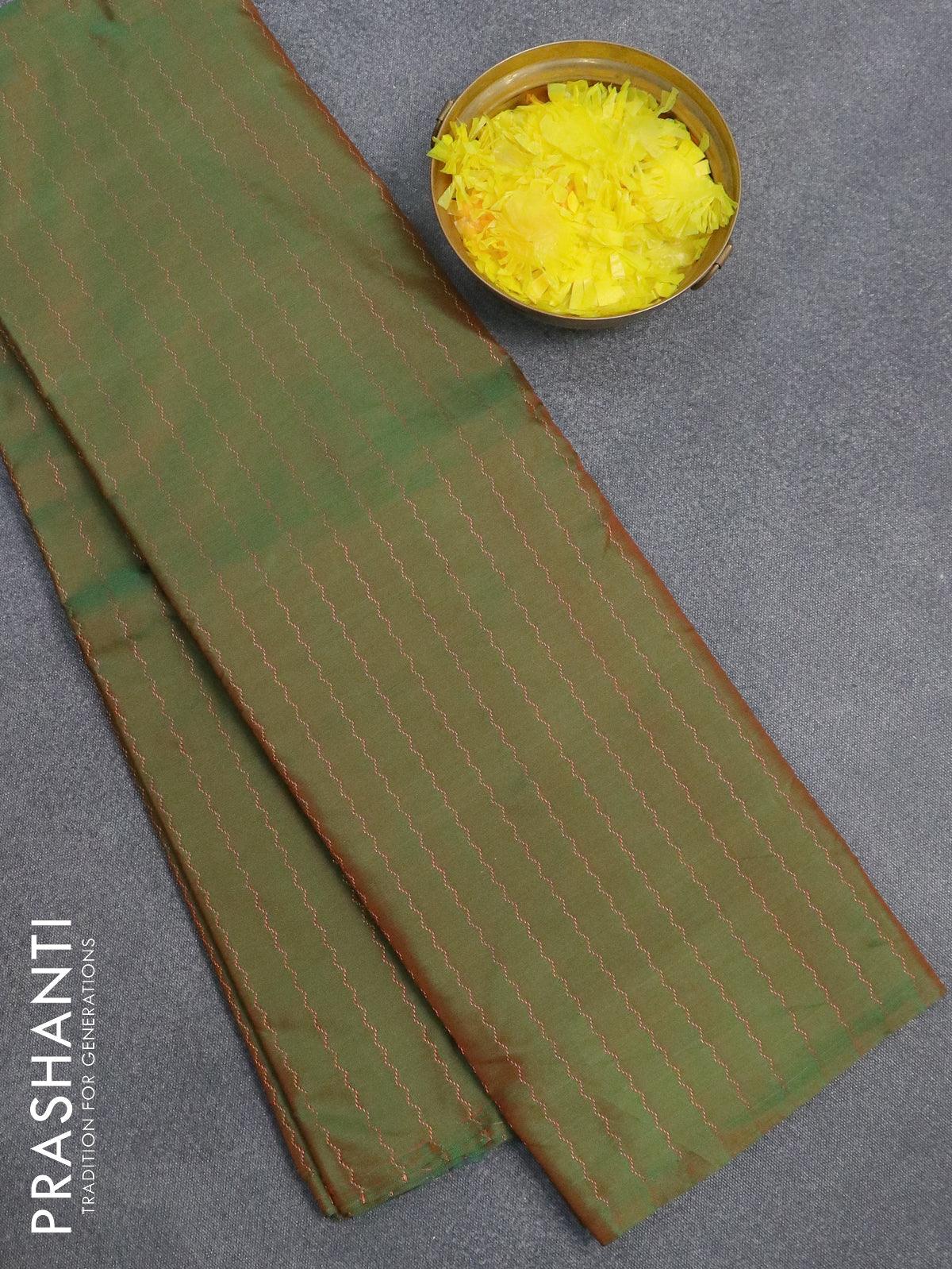 Arani semi silk saree dual shade of green and dual shade of greenish purple with allover zari weaves in borderless style