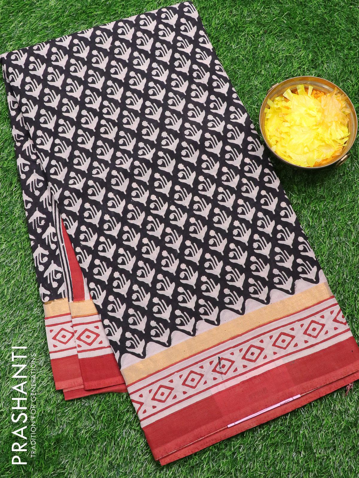 Assam silk saree black and rust shade with allover prints and zari woven simple border