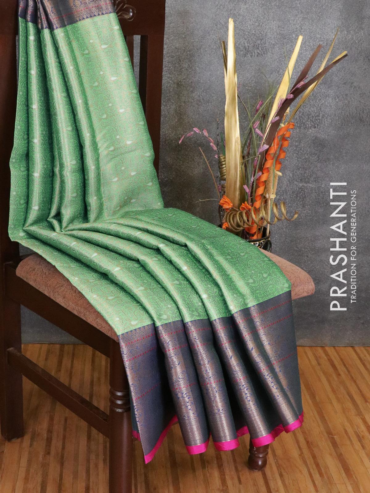 Banarasi kora saree green and blue with allover zari weaves and zari woven border