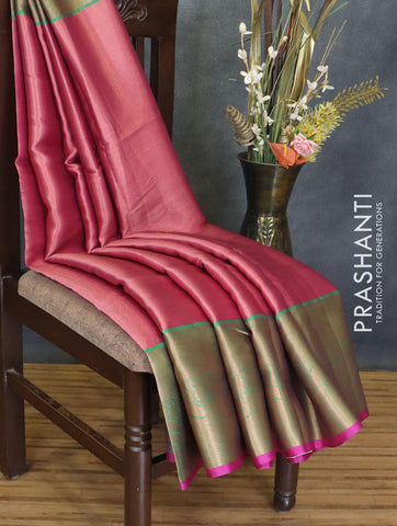 Banarasi kora saree magenta pink shade and green with allover copper zari weaves and long copper zari woven border