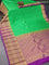 Pure gadwal silk saree light green and deep purple with zari woven buttas and long zari woven floral design zari border