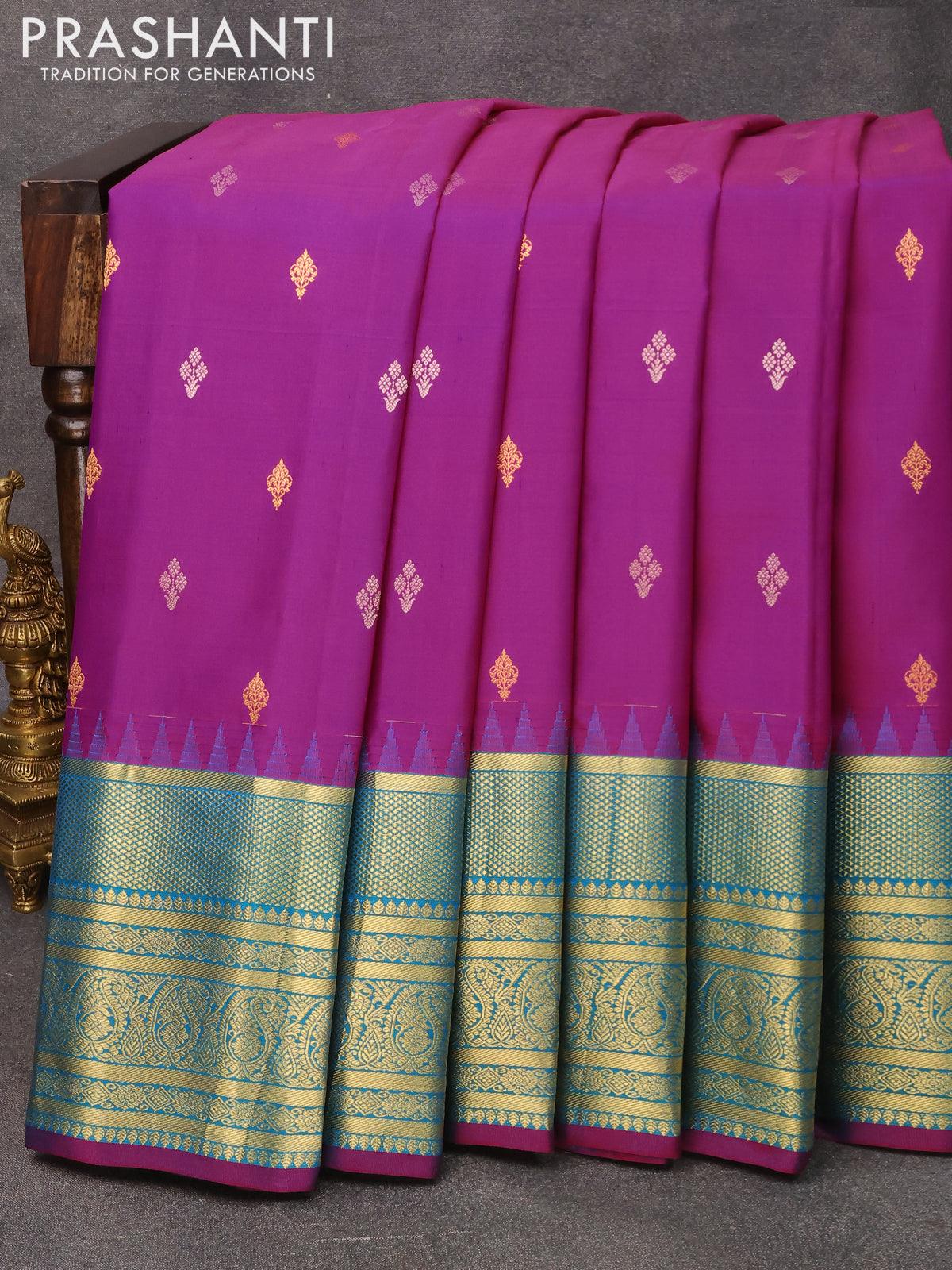 Pure gadwal silk saree magenta pink and cs blue with silver & gold zari woven buttas and temple design long zari woven border