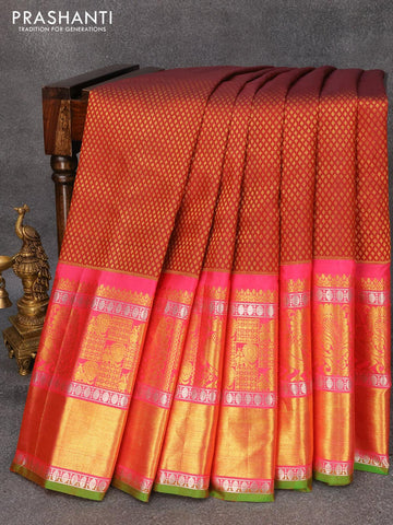 Pure gadwal silk saree maroon and pink with allover zari woven butta weaves and long zari woven border