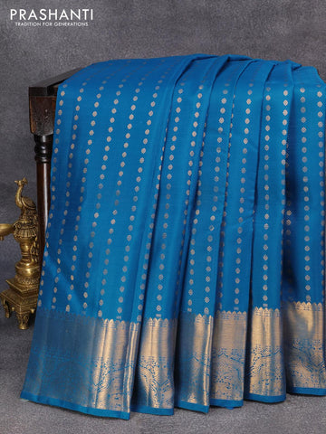 Pure kanjivaram silk saree cs blue with allover zari woven butta weaves and zari woven border