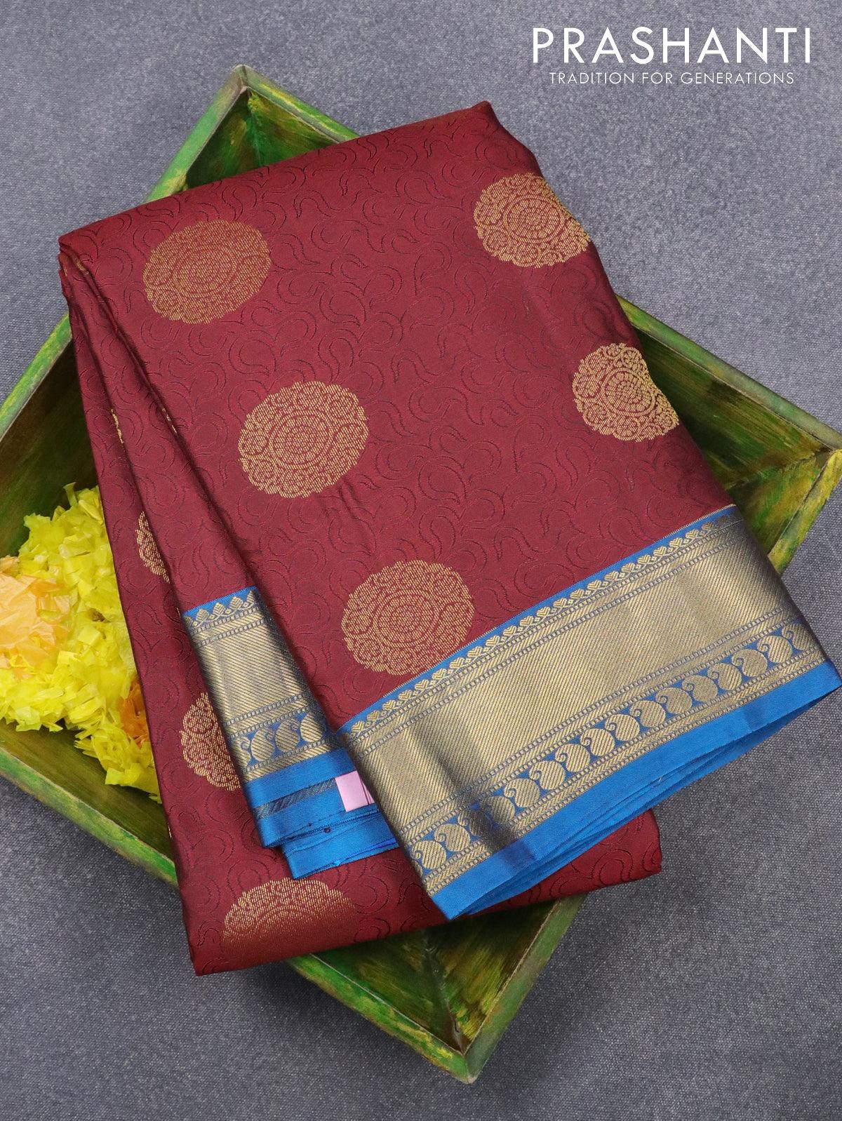 Pure kanjivaram silk saree maroon and cs blue with allover self emboss & zari buttas and zari woven paisley border