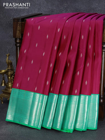 Pure kanjivaram silk saree pink and teal green with allover silver zari woven buttas and silver zari woven border