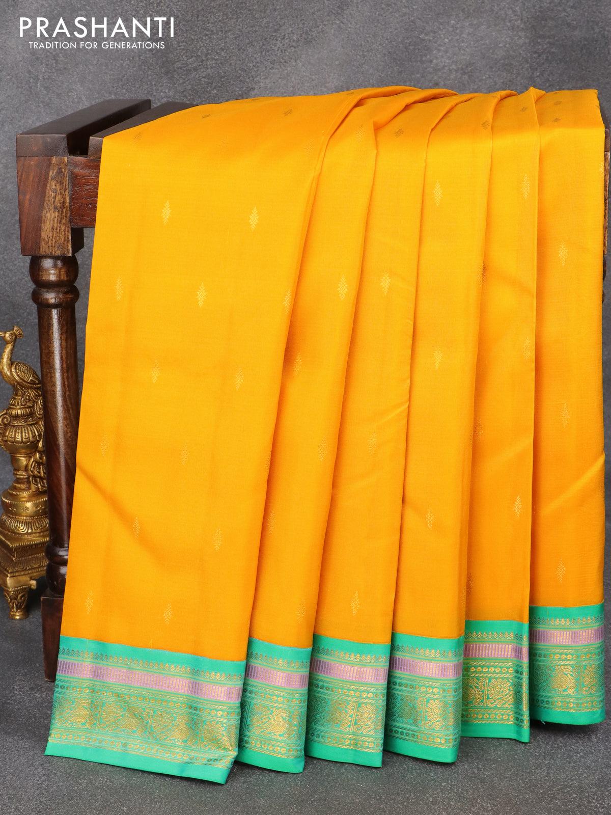 Pure kanjivaram silk saree yellow and teal green with zari woven buttas and annam zari woven border