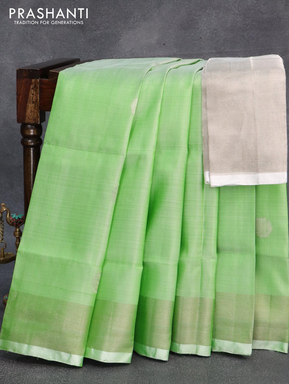 Pure uppada silk saree light green with silver zari woven coin buttas and silver zari woven border