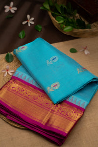 Mandir Sky Blue & Deep Magenta Kuppadam Buttis Saree