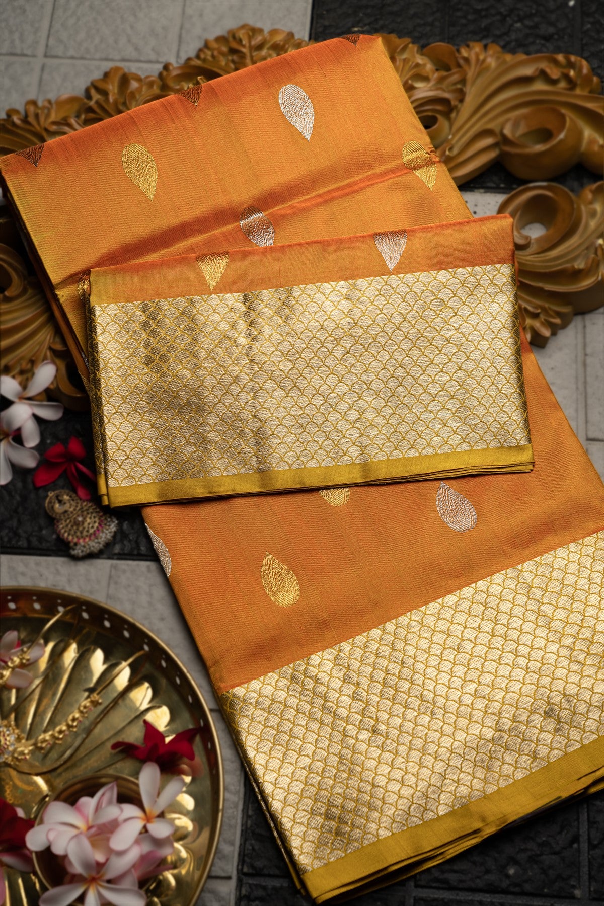 Varamahalakshmi Orange & Mustard Venkatagiri Buttis Saree